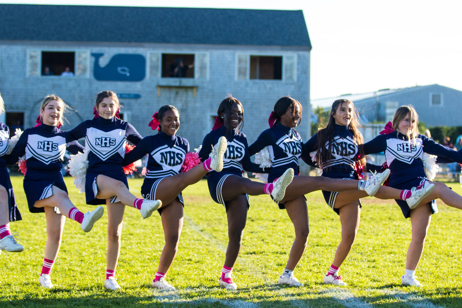 Nantucket cheerleaders perform during halftime of the homecoming game.