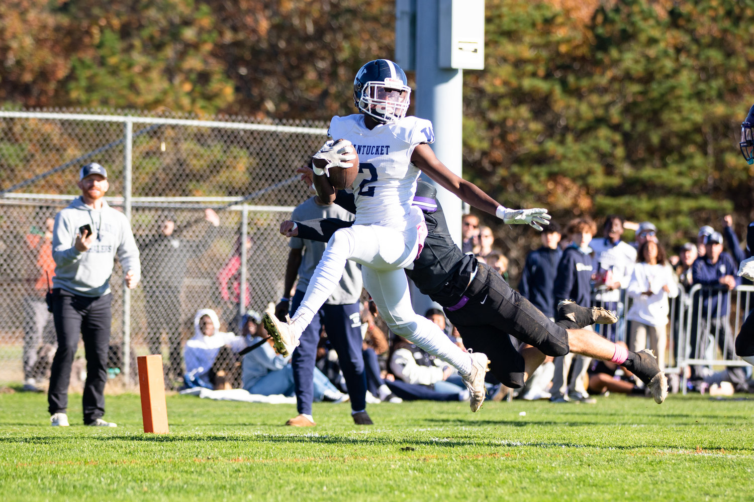Jayquan Francis high steps into the end zone for a first touchdown against Martha's Vineyard.
