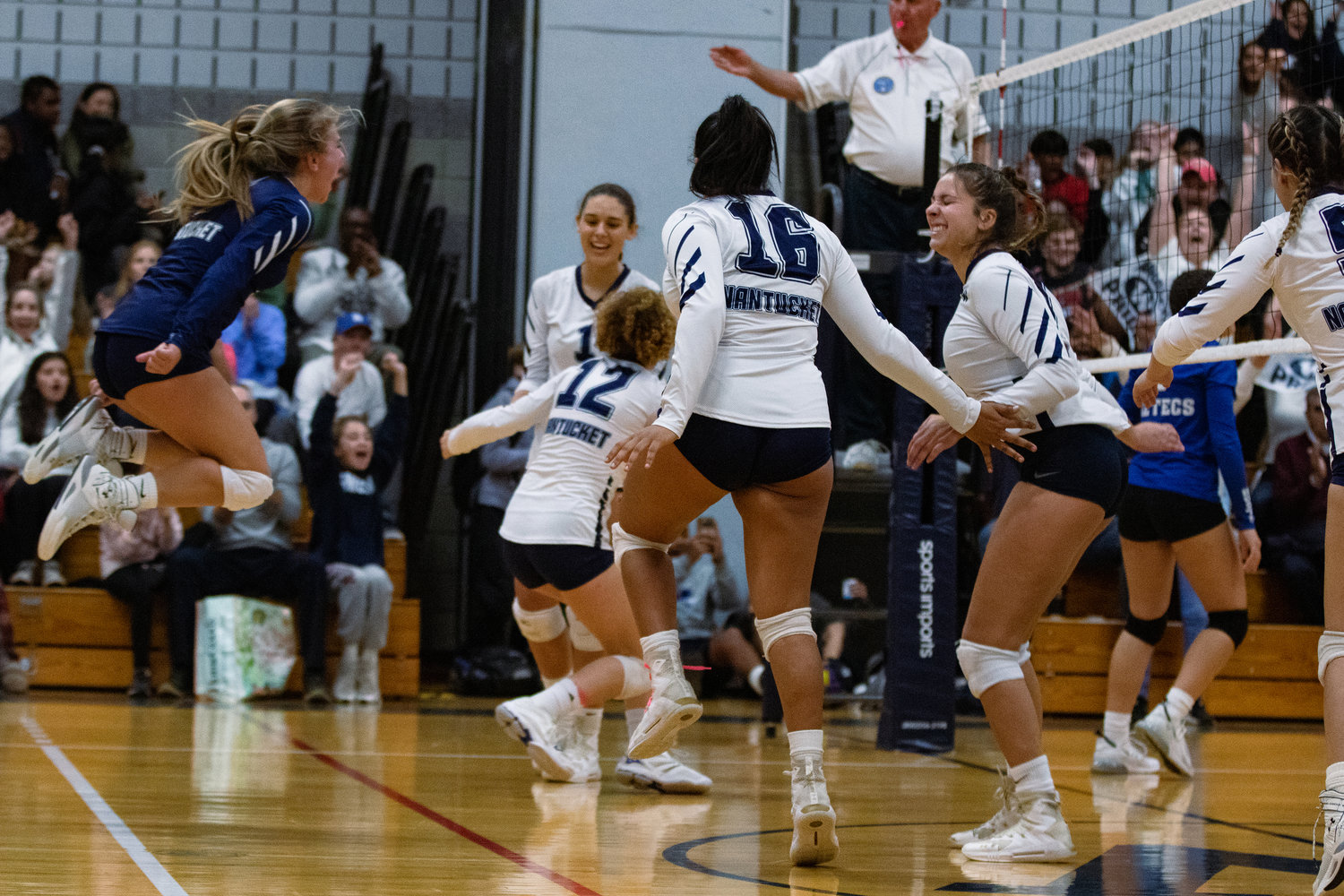 The girls jump in celebration after a huge kill by Kacey Riseborough.