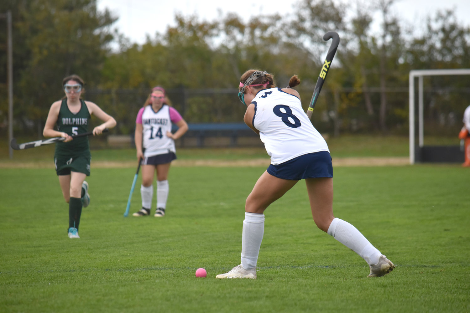 Freshman midfielder Lillian Wullschleger drives the ball down the field during the JV team’s Oct. 25 home game against Dennis-Yarmouth.