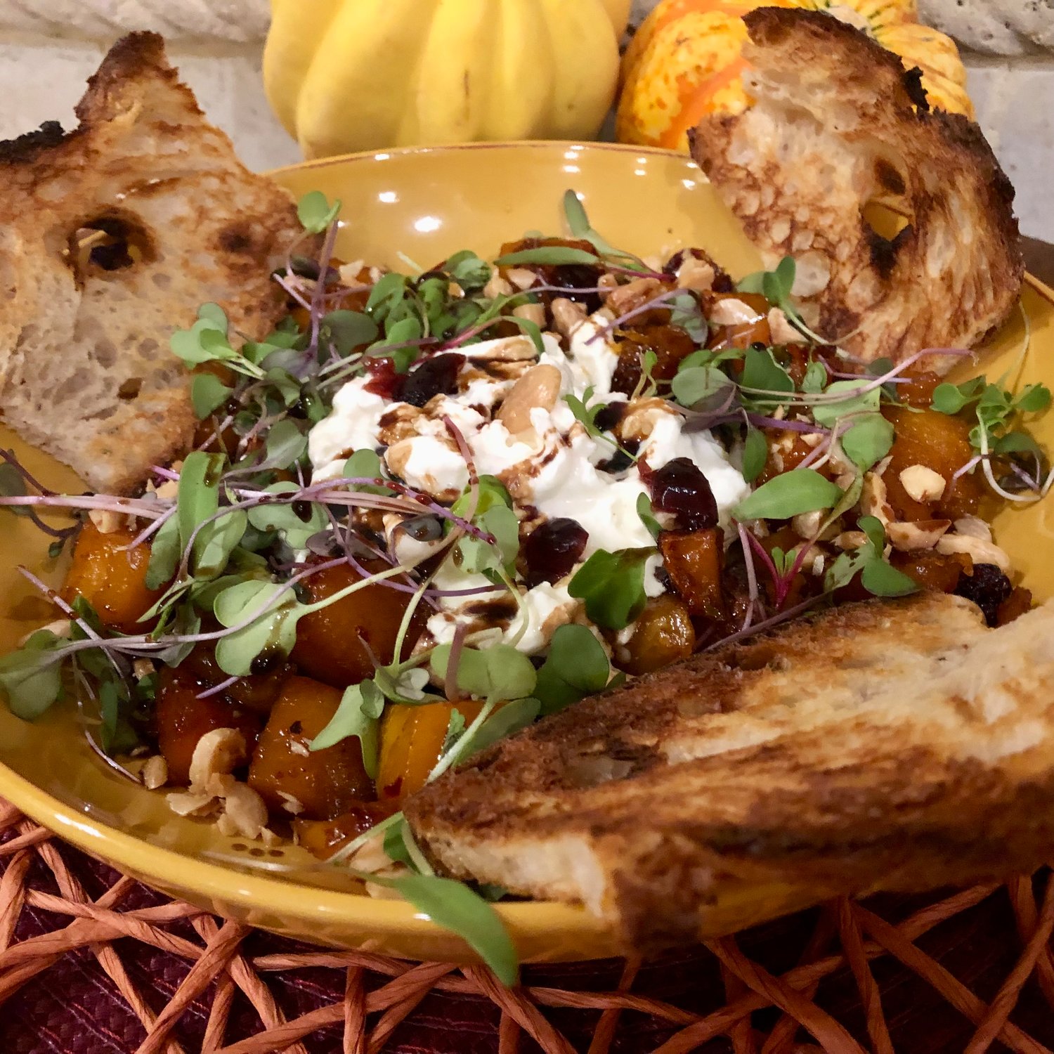 Caramelized Butternut Squash with Burrata is an upscale, meatless main dish to serve the night before tackling the turkey on Thanksgiving.