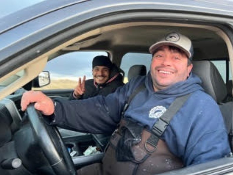 Alvaro Soares, driving, and Eric Gotay stayed with the sunfish until the Marine Mammal Alliance arrived.
