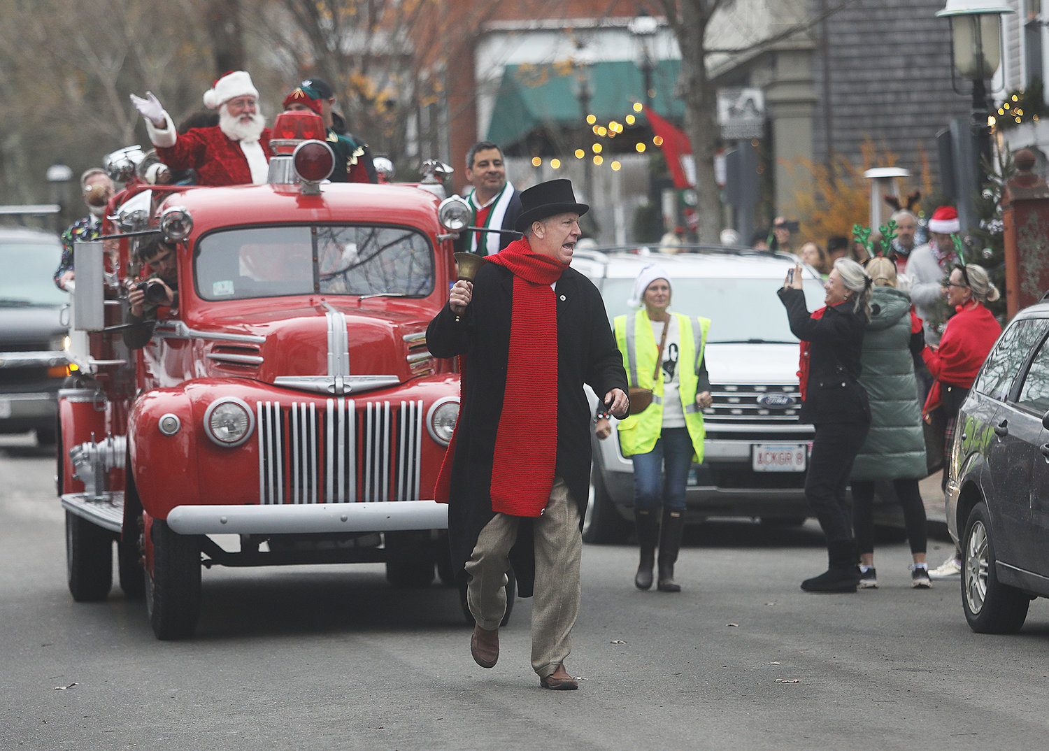 DECEMBER 3, 2022 -- Town Crier Eric Goddard leads the Santa parade down Broad Street during Christmas Stroll. Photo by Ray K. Saunders