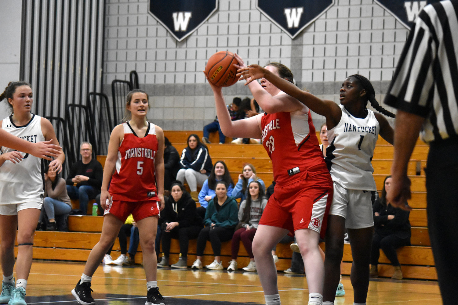 Kiesha Fowler, right, disrupts a shot during the Whalers’ game against Barnstable.