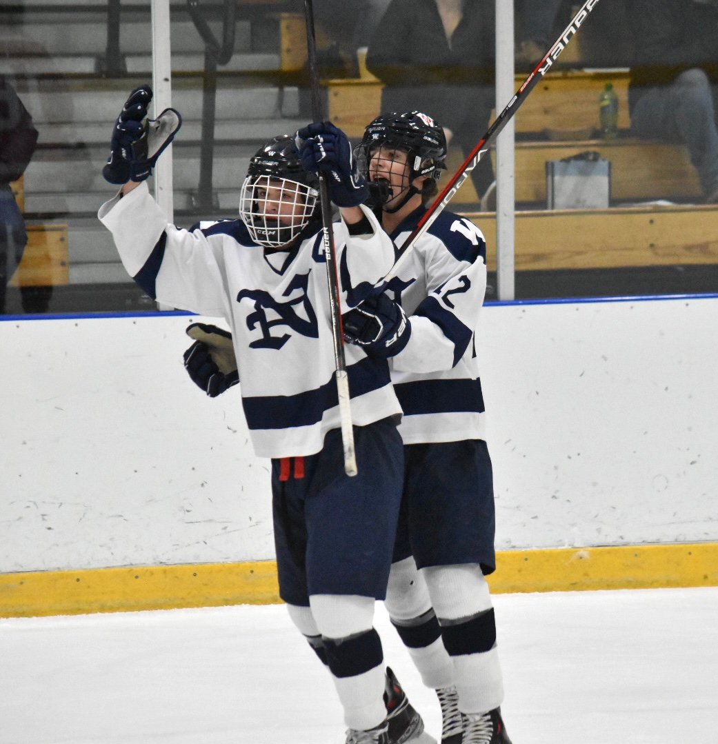 Jack Billings and Ryan Davis celebrate after Billings' goal during the Whalers' 3-2 win Saturday at home against Barnstable.