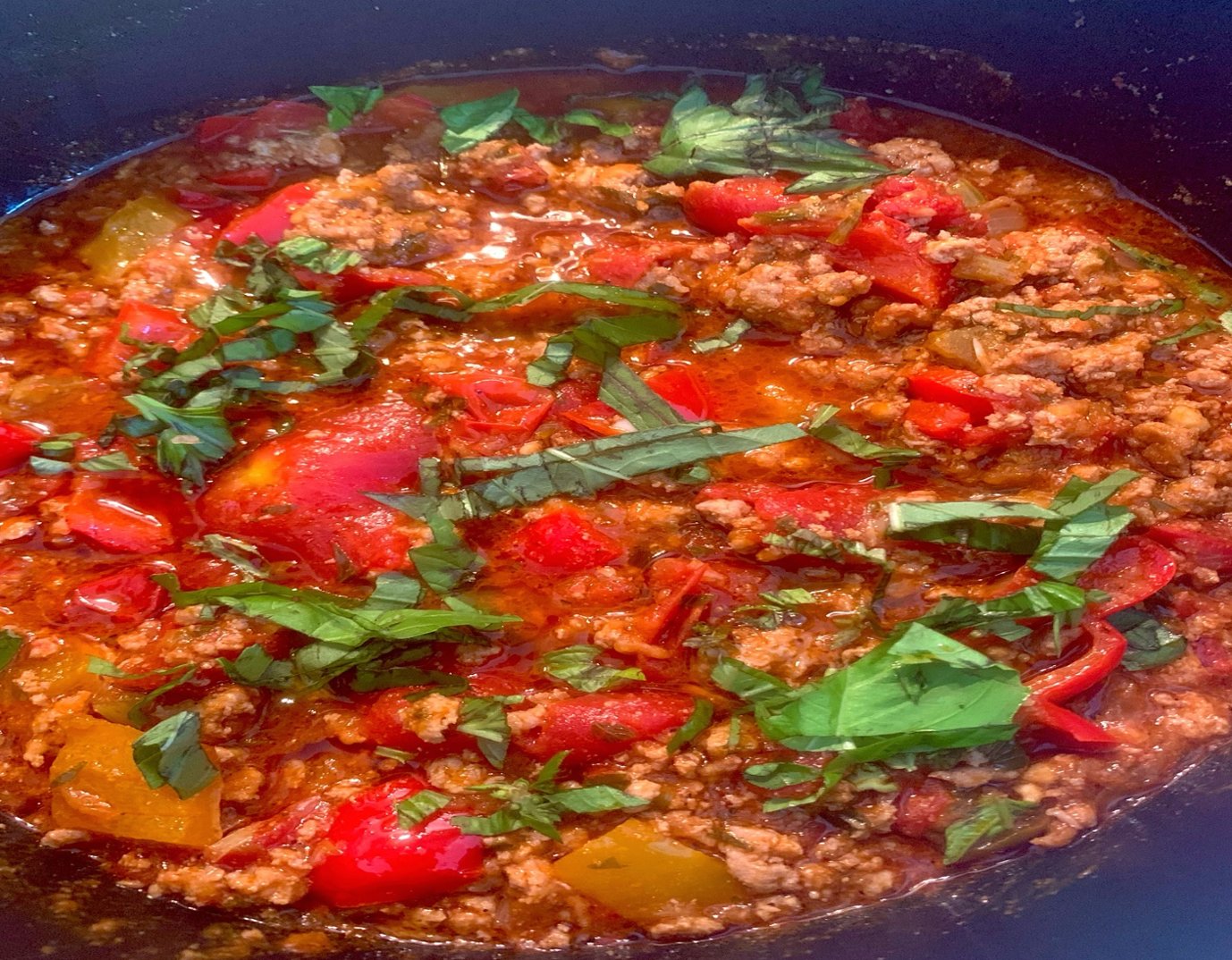 Wondering what to do with leftover turkey? Try making some chili with sweet Italian sausage, red and orange peppers.