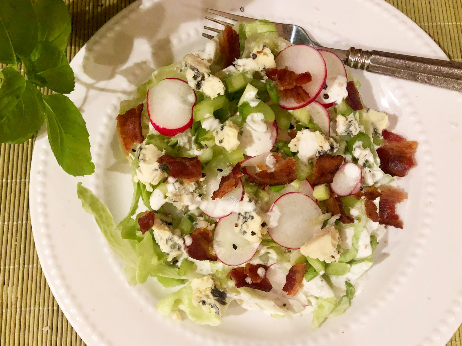 Crispy bacon makes this Crunchy Iceberg and Celery Salad with Creamy Blue Cheese an all-season favorite.