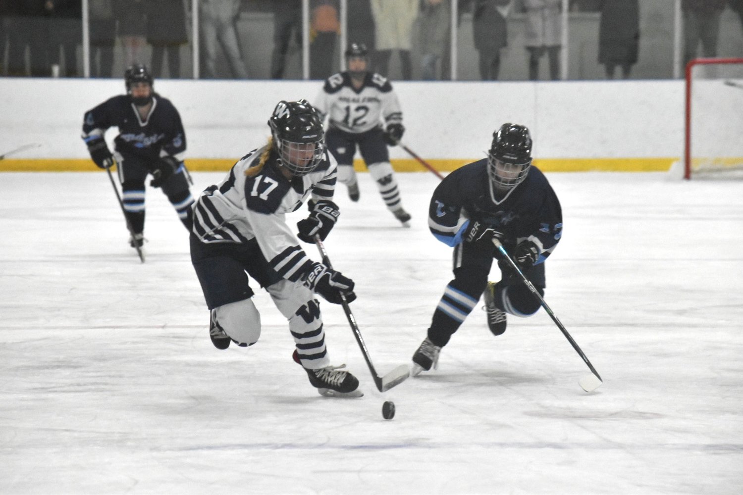 Bailey Lower carries the puck into the offensive zone during Saturday's game against Sandwich.