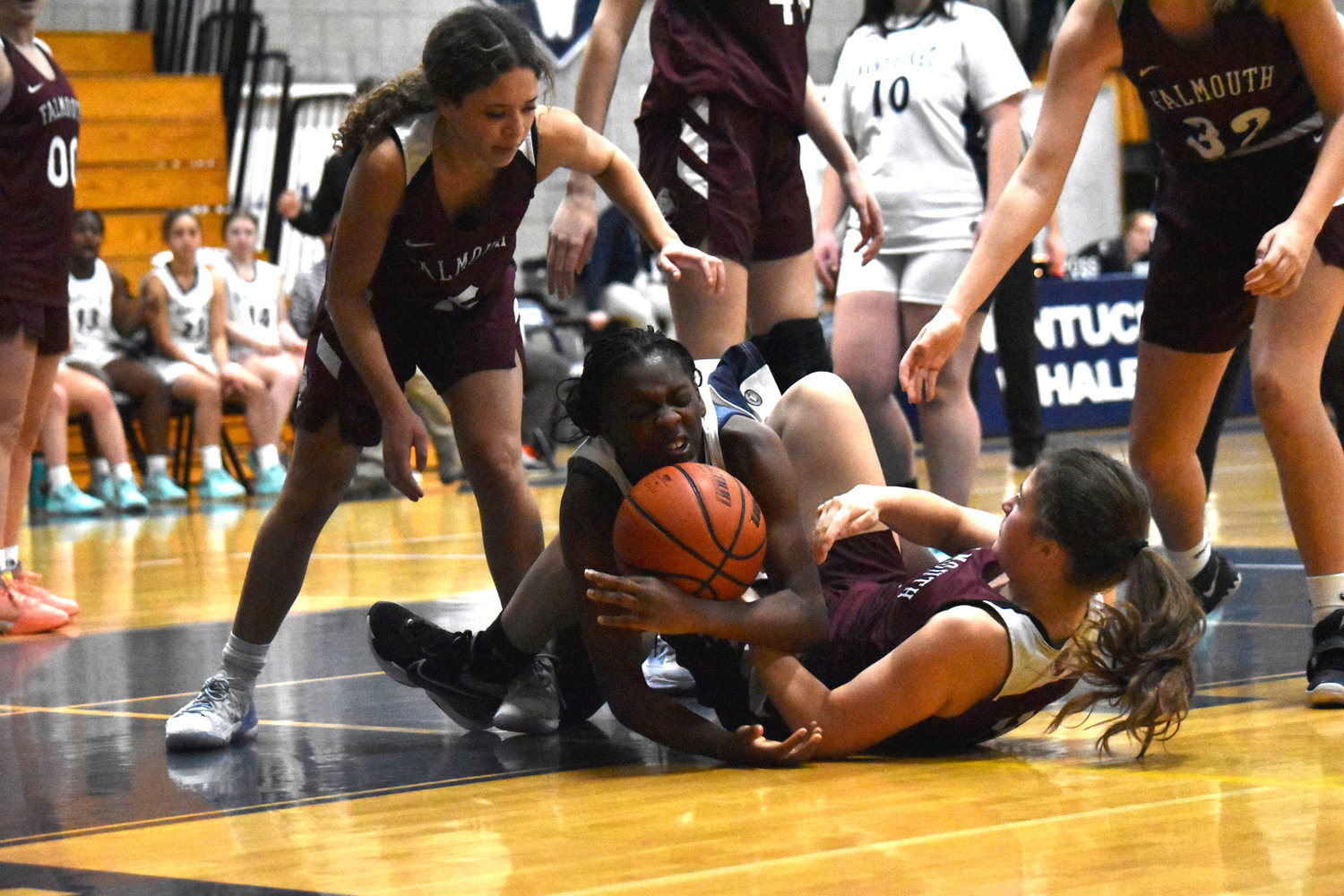 Mikesha Fowler dives on a loose ball during last Tuesday’s home game against Falmouth.