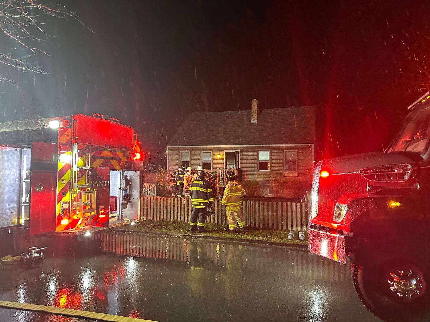 Firefighters respond to a fire at 3 Alexandria Drive Thursday evening.