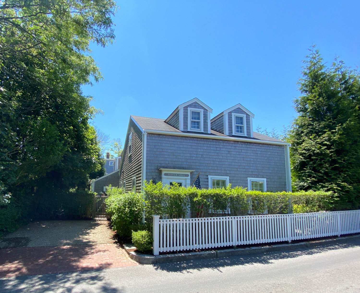 Located on the outskirts of town on a quaint one-way street, this five-bedroom, four-and-a-half-bathroom home was built in 1800 and beautifully renovated to incorporate modern charm.