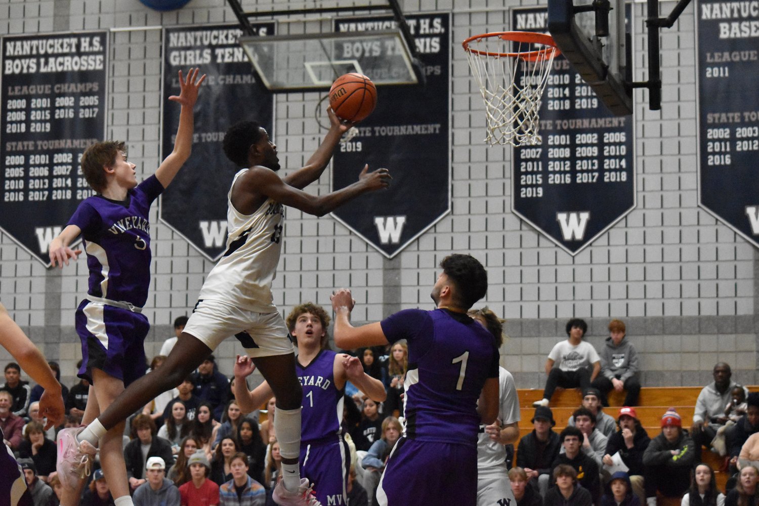 Jayquan Francis rises up for a layup during Saturday's game against Martha's Vineyard.