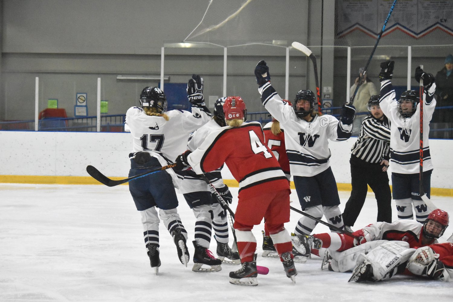 The Whalers celebrate Bailey Lower's second period goal during Saturday's game against Barnstable.