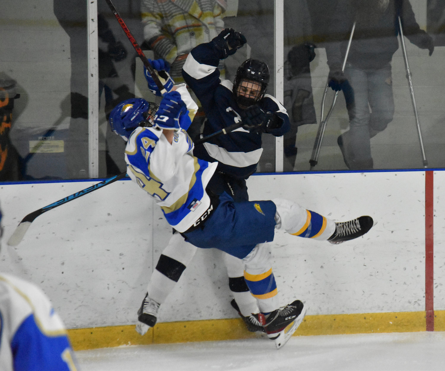 Hunter Strojny hits a St. John Paul II player during the Whalers' 6-2 win Wednesday.