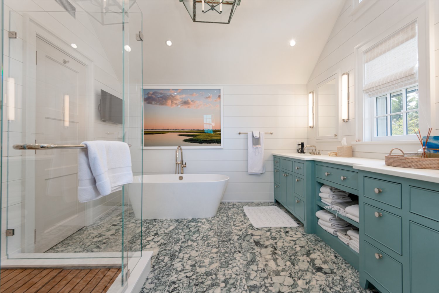 The master bath has a soaking tub and glass-enclosed shower.