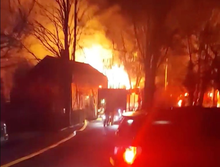 Flames rip through an unoccupied home on West York Lane early Thursday morning.
