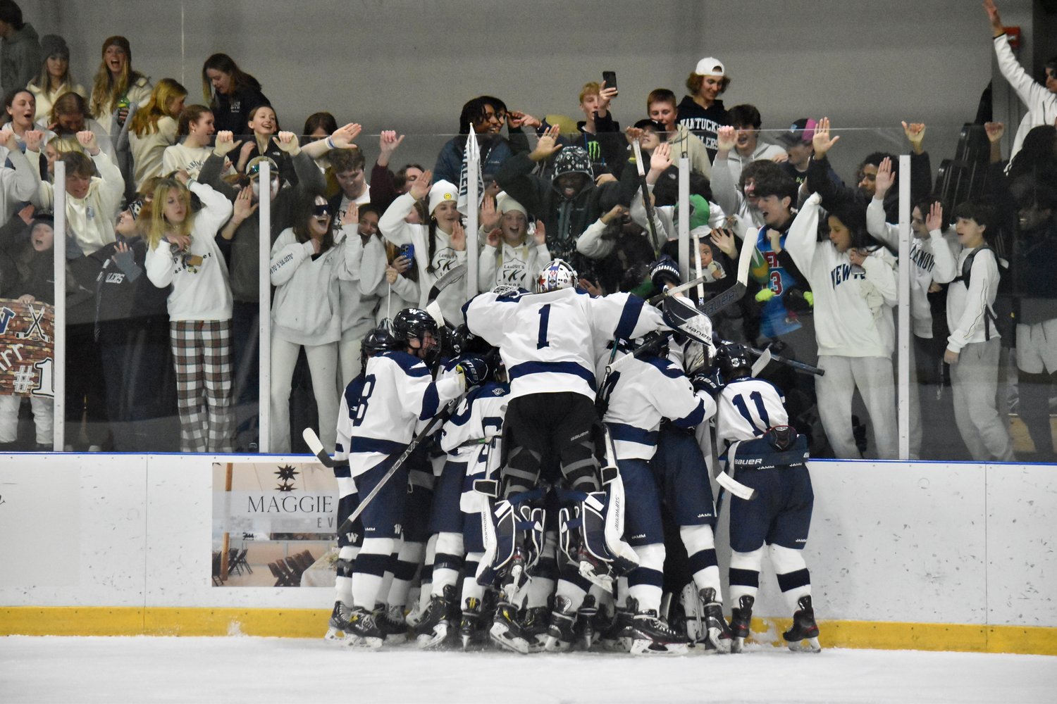 The Whalers celebrate in front of the student section after their 6-2 win Monday over Abington in the sweet 16.