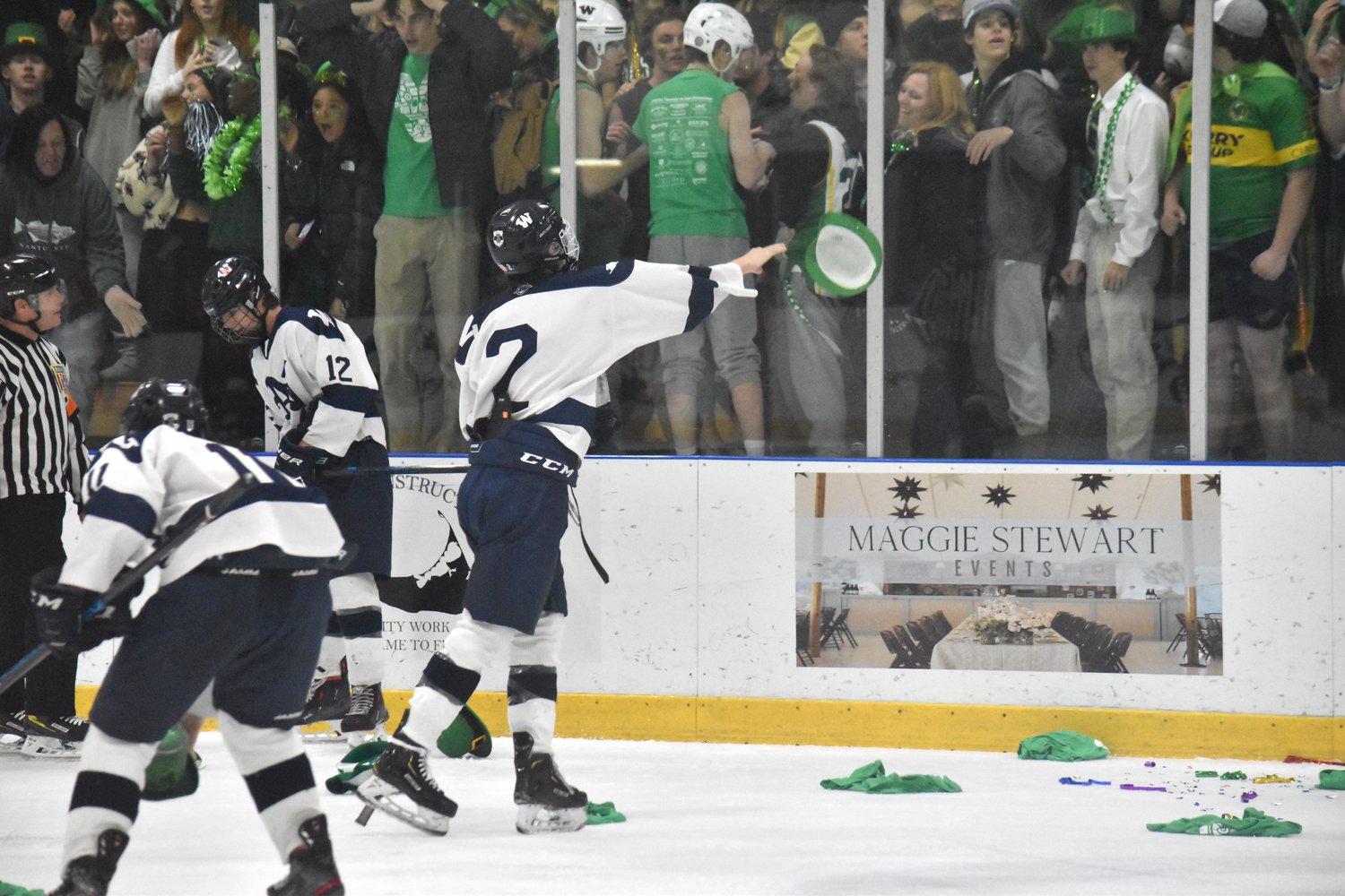 Braden Knapp (2) tosses a hat back into the crowd after his game-sealing goal with 1.4 seconds remaining.