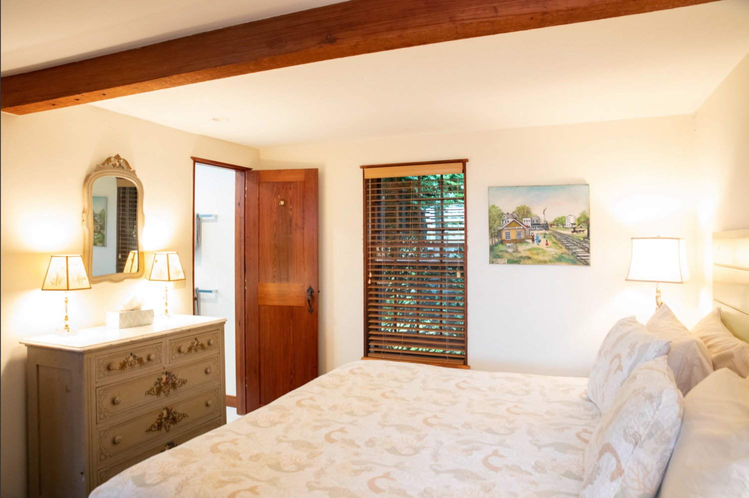 The main house features a master bedroom as well as a guest bedroom with an en-suite bathroom.