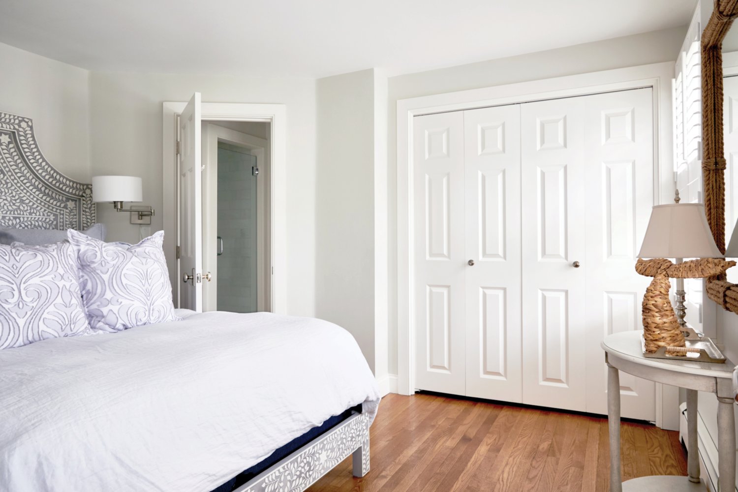 This bedroom has ample closet space and an en-suite bathroom.