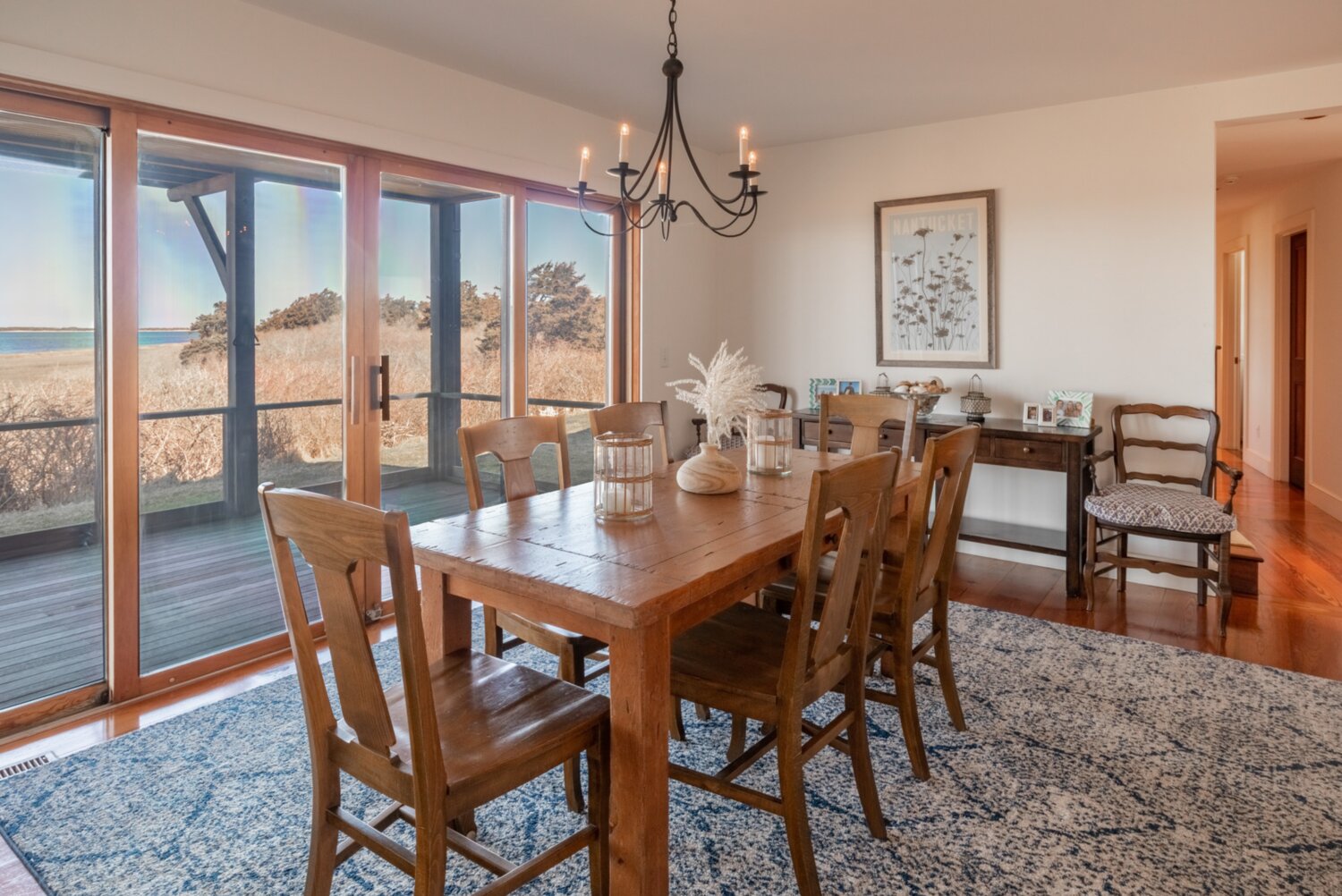 The dining room overlooks the screened-in porch.