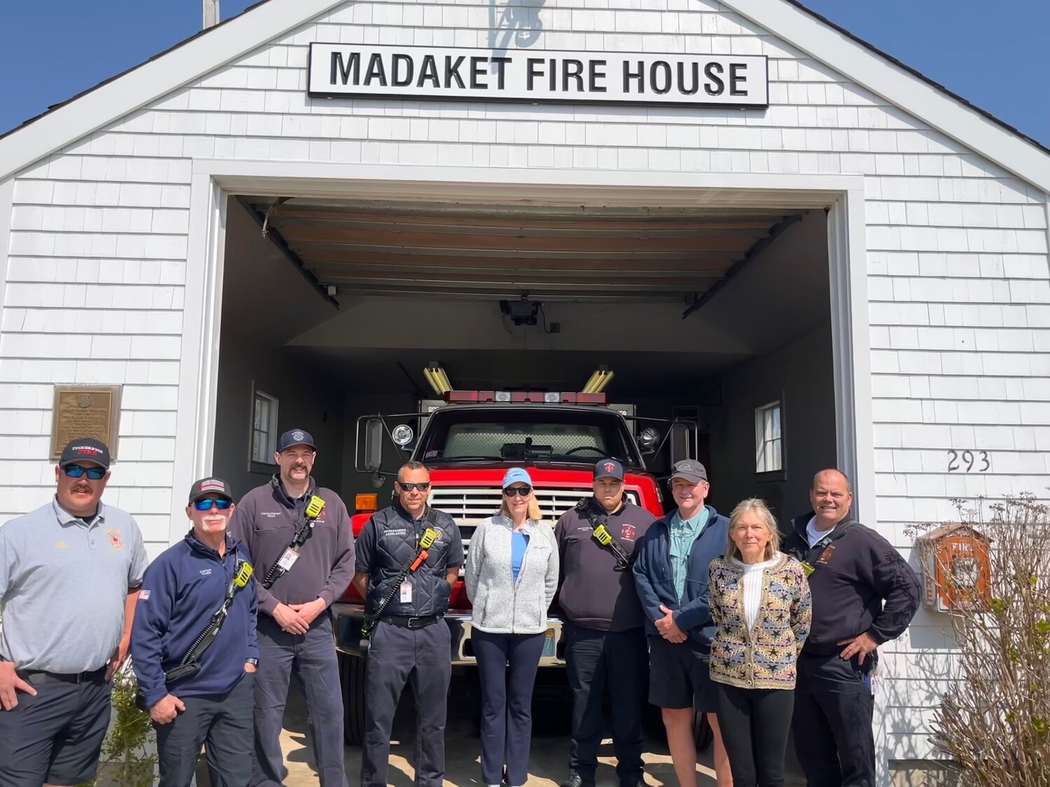 Representatives of the Madaket Conservation Association, Nantucket Fire Department and Madaket Marine outside the Madaket firehouse Thursday.