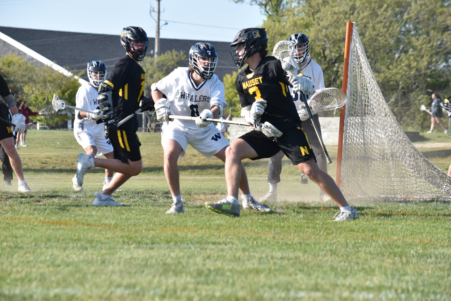 Griffin Starr defends against a Nauset player.