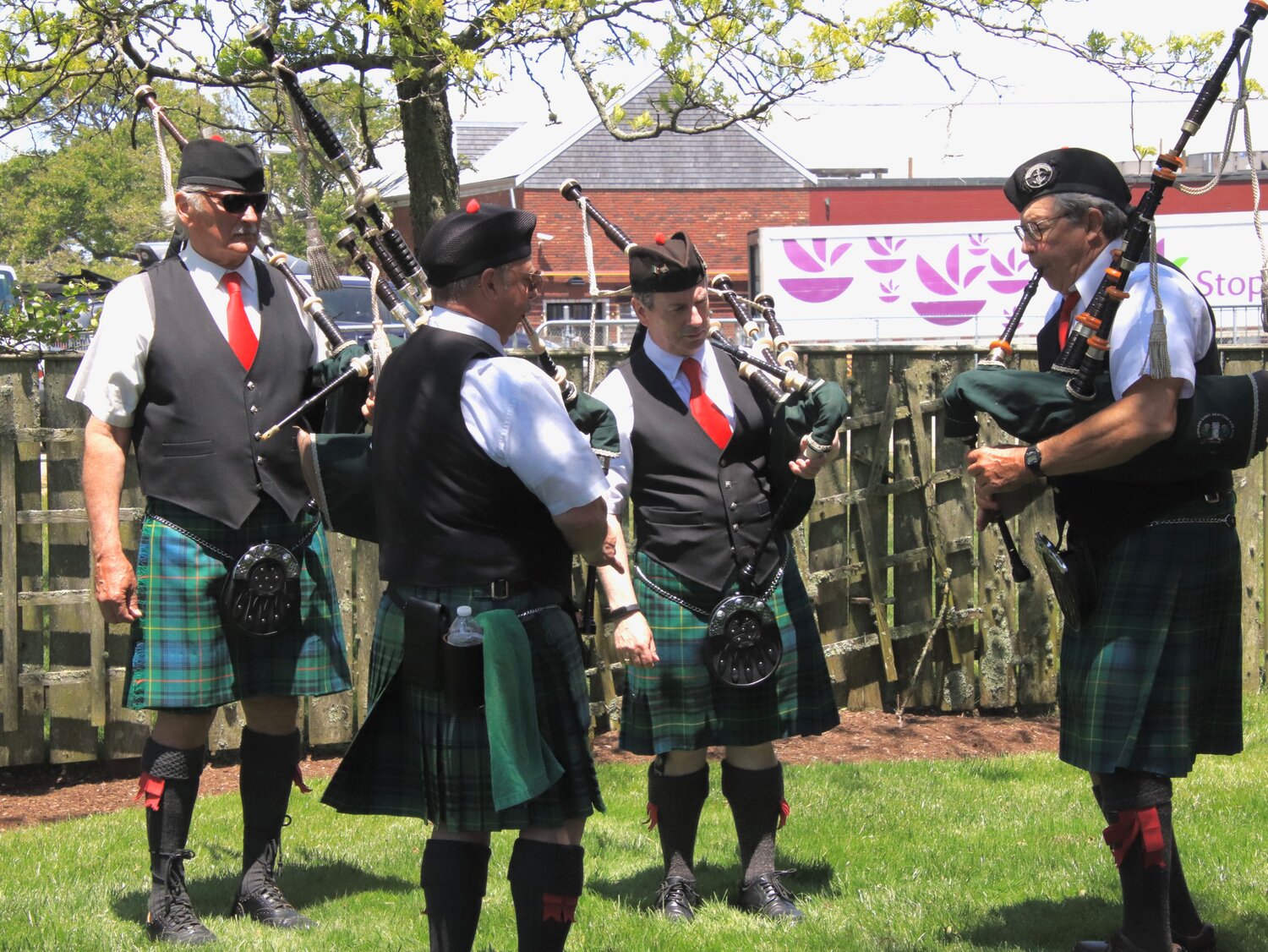 Bagpipers from the Highland Light Scottish Pipe Band.
