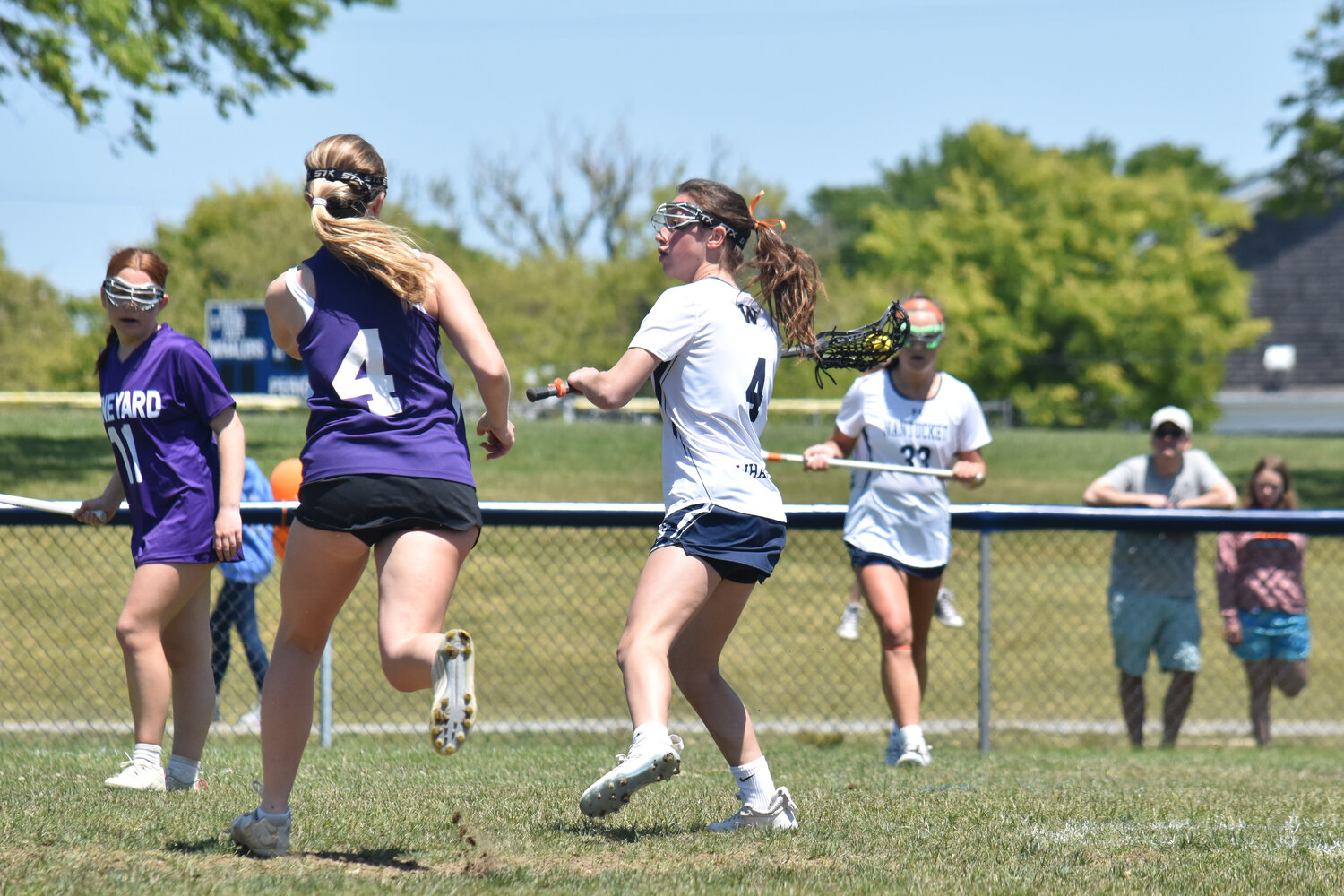 Carley Ray looks for a shot during the girls lacrosse team's 17-2 win Saturday over Martha's Vineyard.
