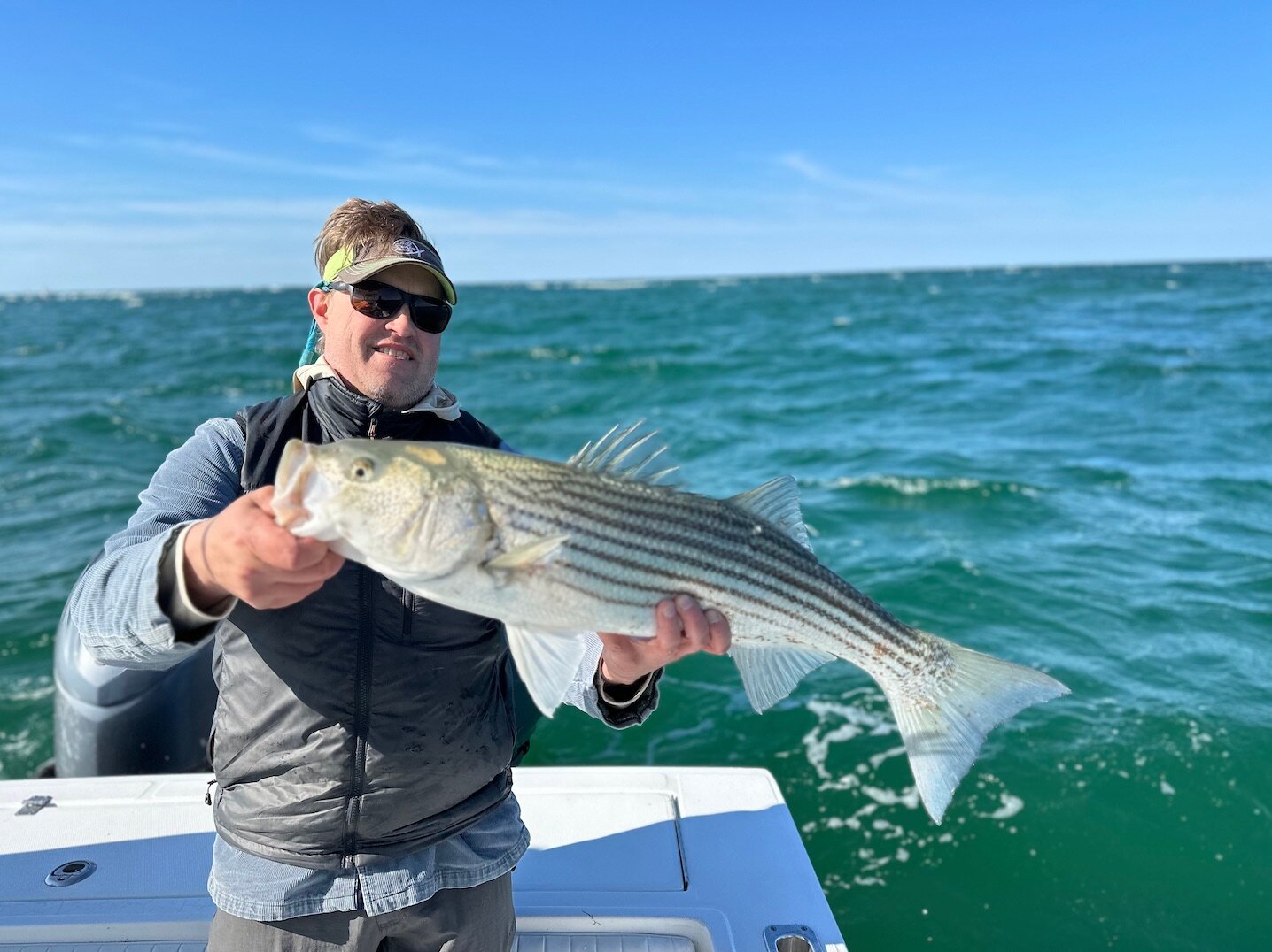 Rick Beaudette with a large striped bass caught off the west end this week.