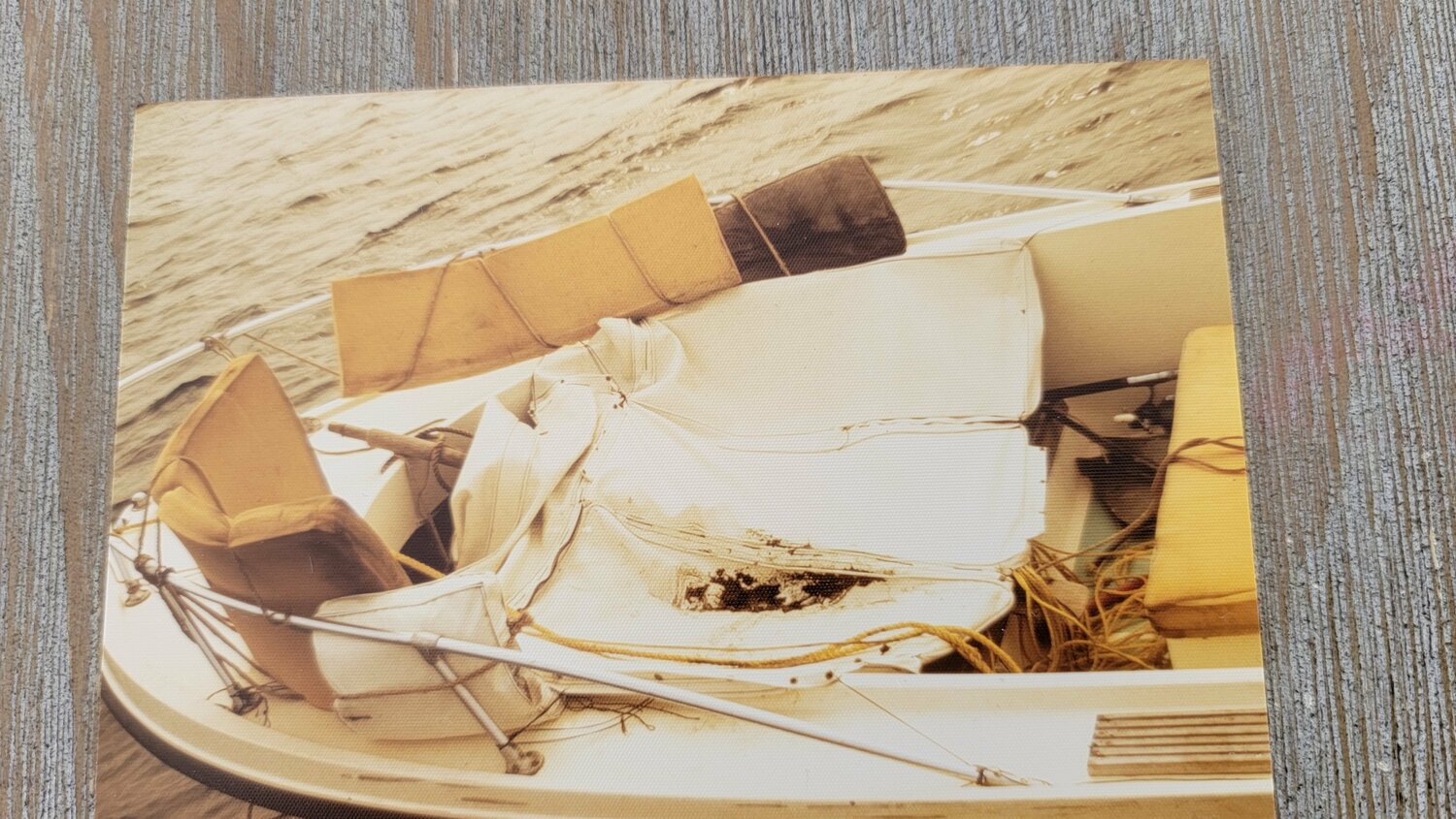 A photo from 1973 of the 19-foot boat six adult siblings were stranded in, including the makeshift canopy they slept under made from the cushions of the boat.