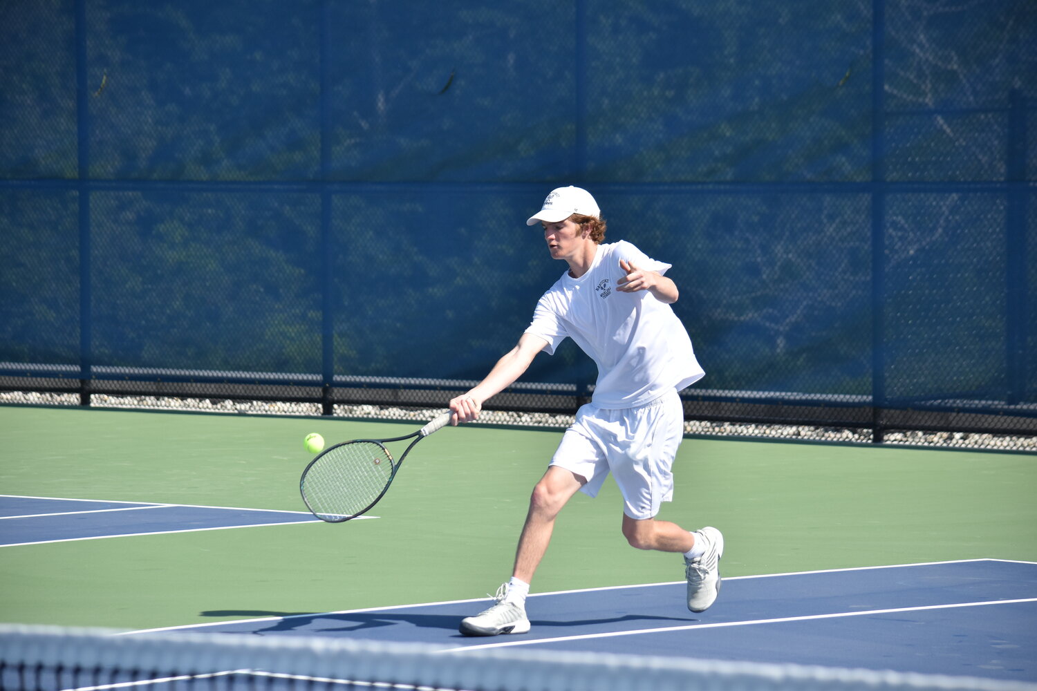 Hawkin Edwardes returns a shot during the Whalers' 4-1 win Friday against Seekonk in the round of 32 of the Div. 4 boys tennis state tournament.