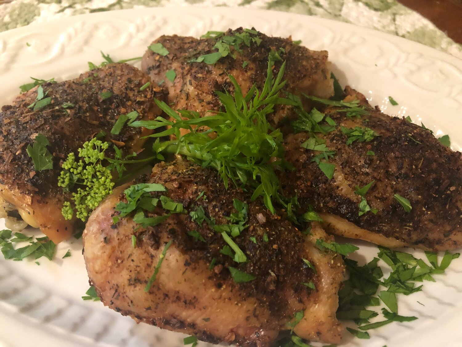 Green Goddess Chicken Thighs are cooked low and slow, yielding a meat with texture and taste similar to duck confit.