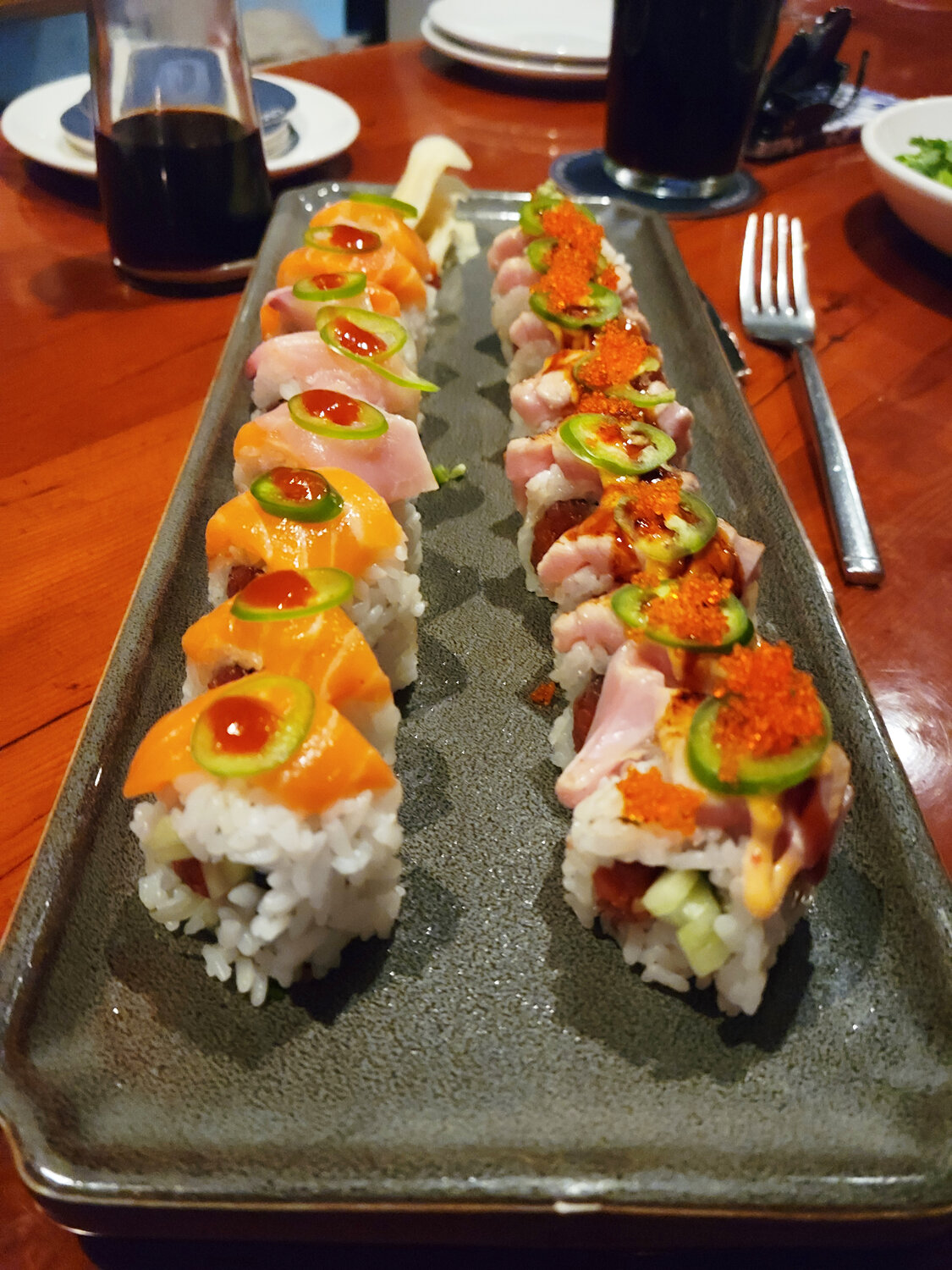 The Triple Salmon Roll has both raw and seared salmon and salmon roe.
