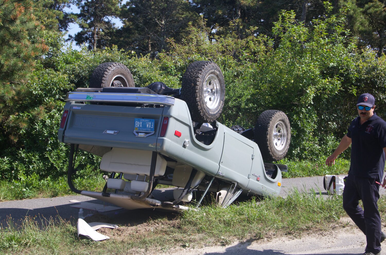 This vintage Ford Bronco rolled with a family of five inside rolled over on Bartlett Road Saturday afternoon.