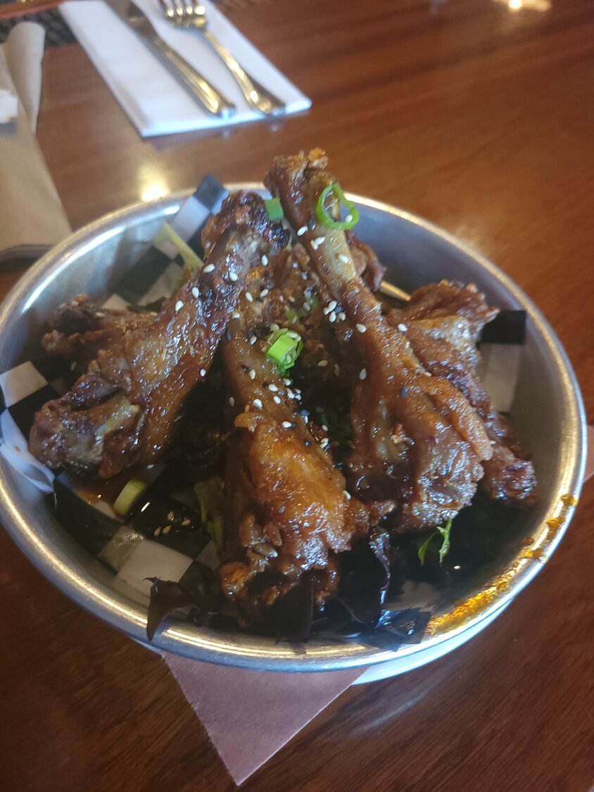The Korean barbecued duck wings add an Asian flair to the B-ACK Yard BBQ menu.
