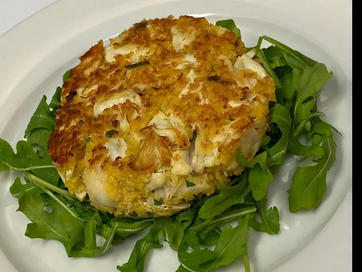 Petrichor’s crab cake is pure lump crabmeat, pan-sautéed without bread crumbs.