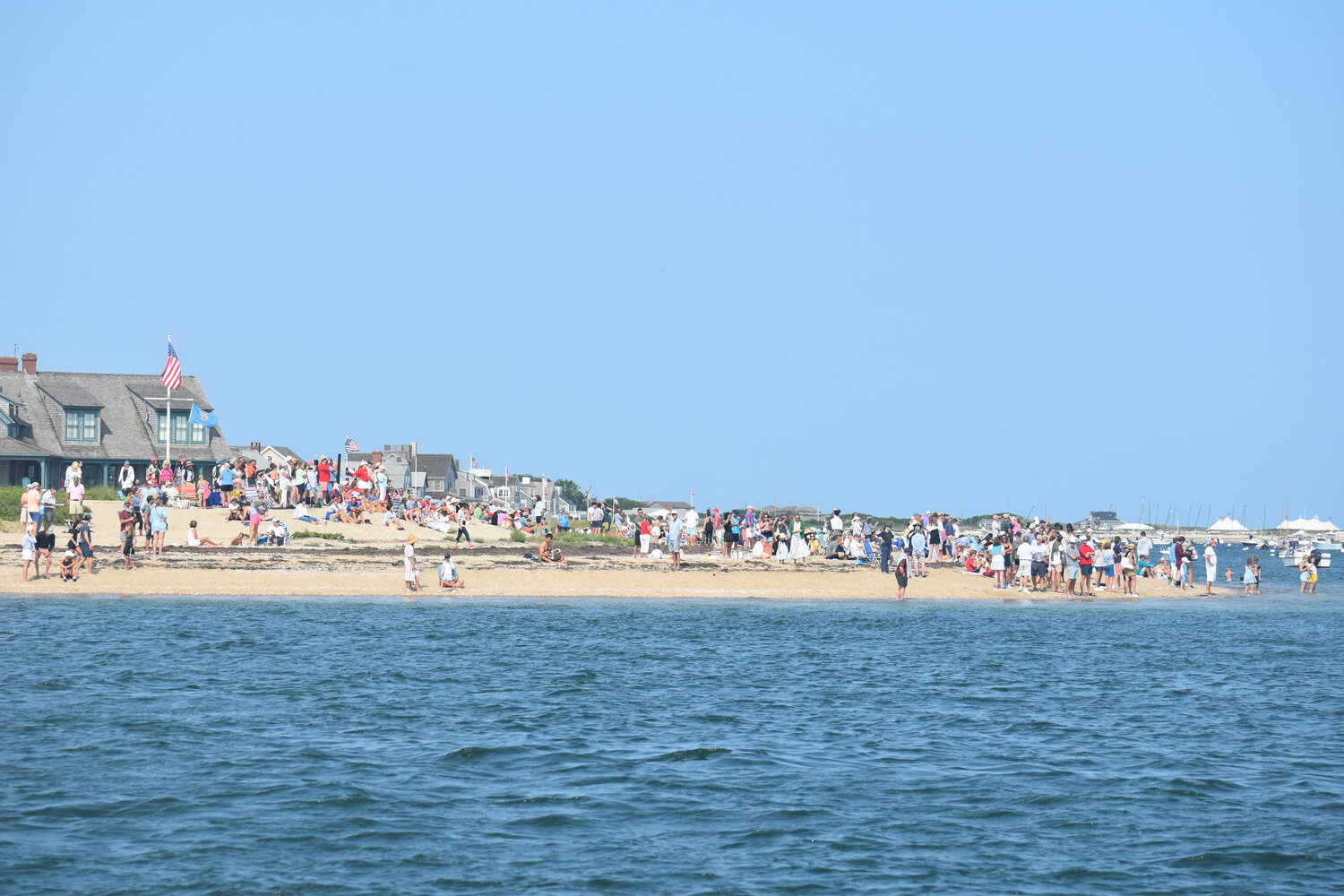 The crowd by Brant Point Light for the Rainbow Parade preceding the 51st annual Opera House Cup.