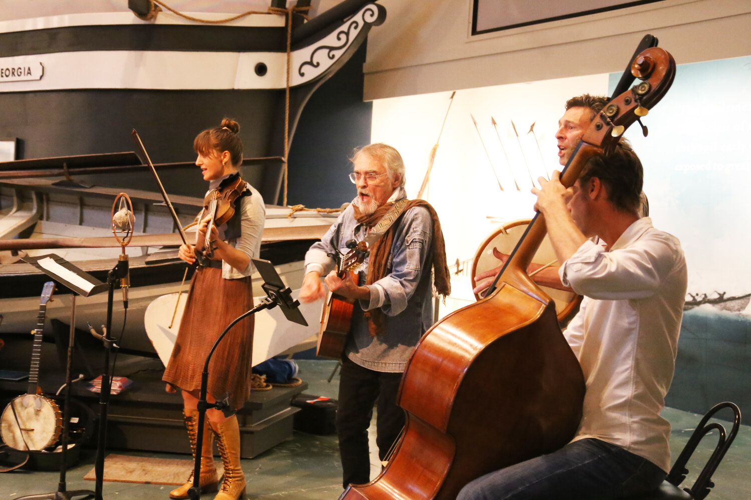 From left, Graeme Durovich, Bill Schustik, Pete Arsenault and Nigel Goss perform a sea shanty at the Nantucket Whaling Museum last week.