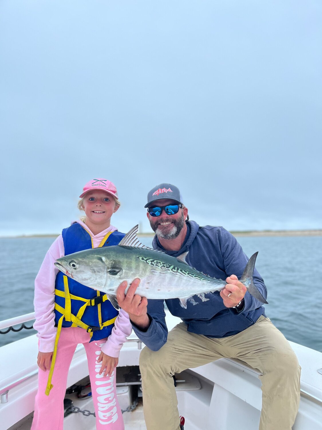 Benji and Lucy Halsell with Lucy’s first false albacore.