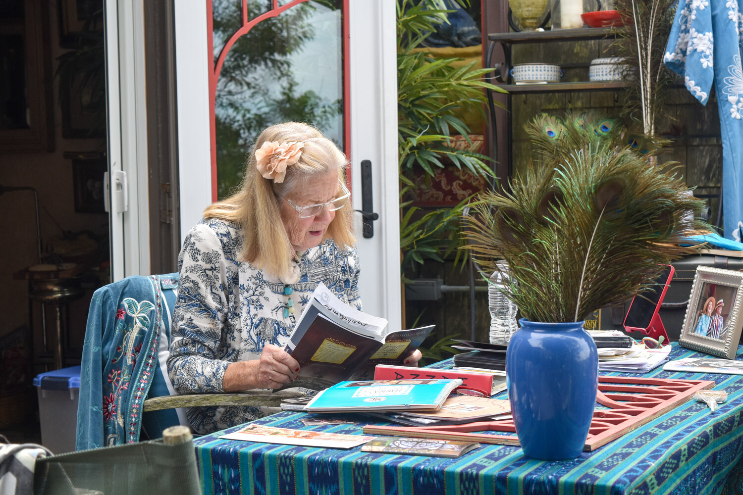Beverly Hall reads a passage from her memoir, “Becoming Hanna,” at her Madaket home Monday.