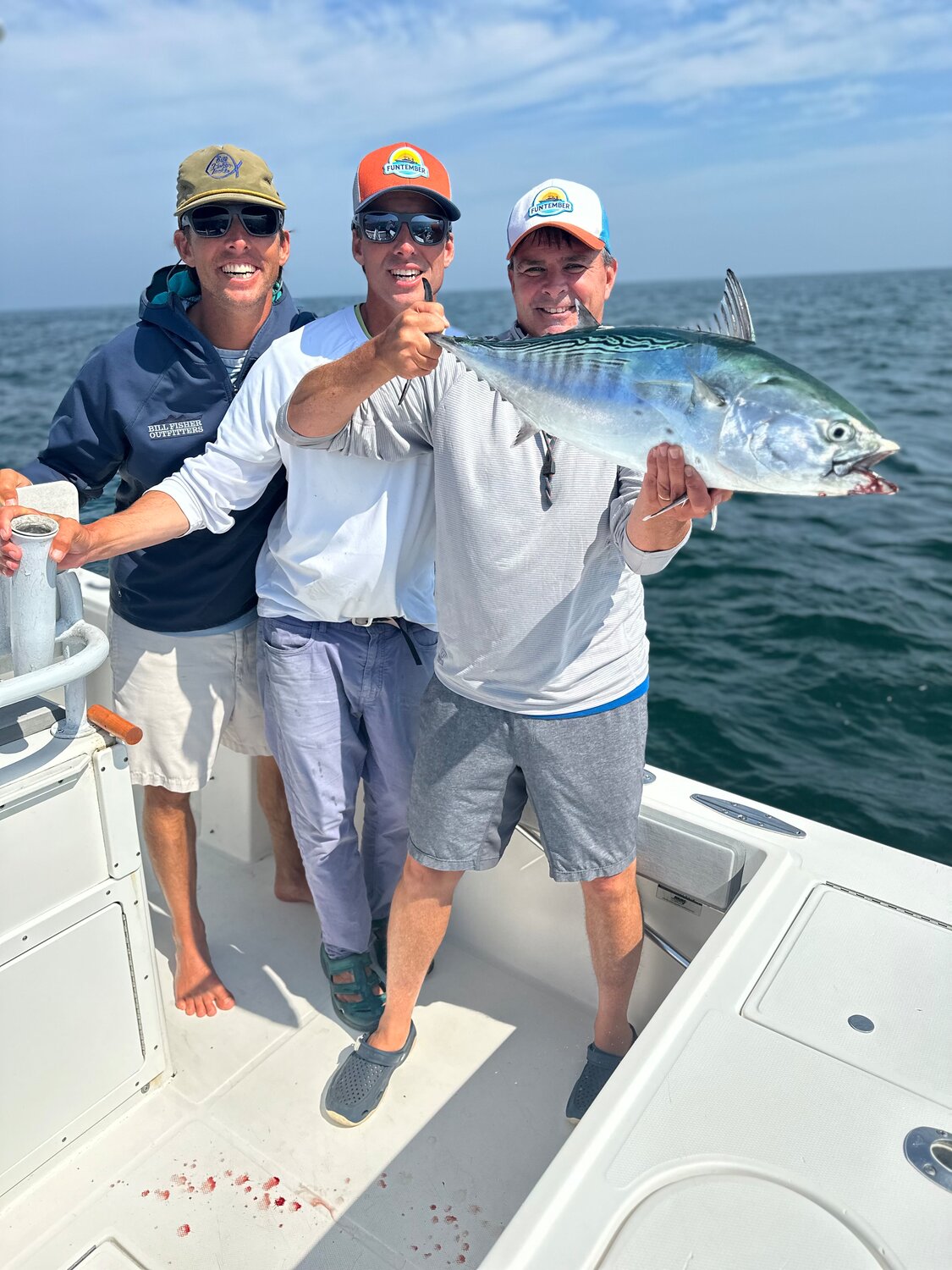 The Gammill Brothers – Capt. Corey, Capt. Cam and Ken – with a false albacore they caught this week.