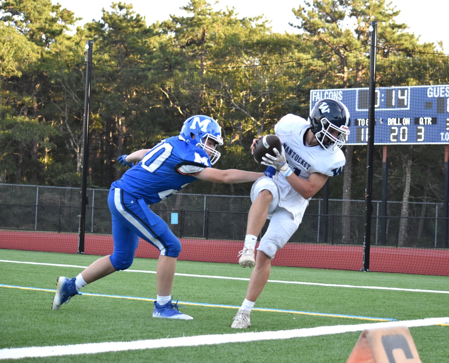 Arann Hanlon catches a touchdown pass on the final play of the Whalers' 34-7 loss Thursday at Mashpee.