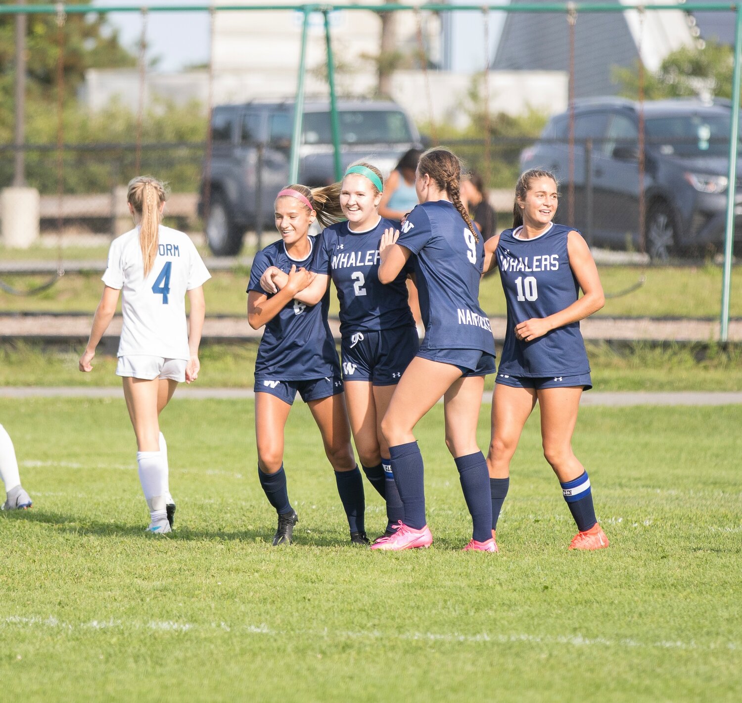 From left, Gabby Nikolova, Chelsea Gross, Myah Johnson and Claire Misurelli celebrate after a goal.