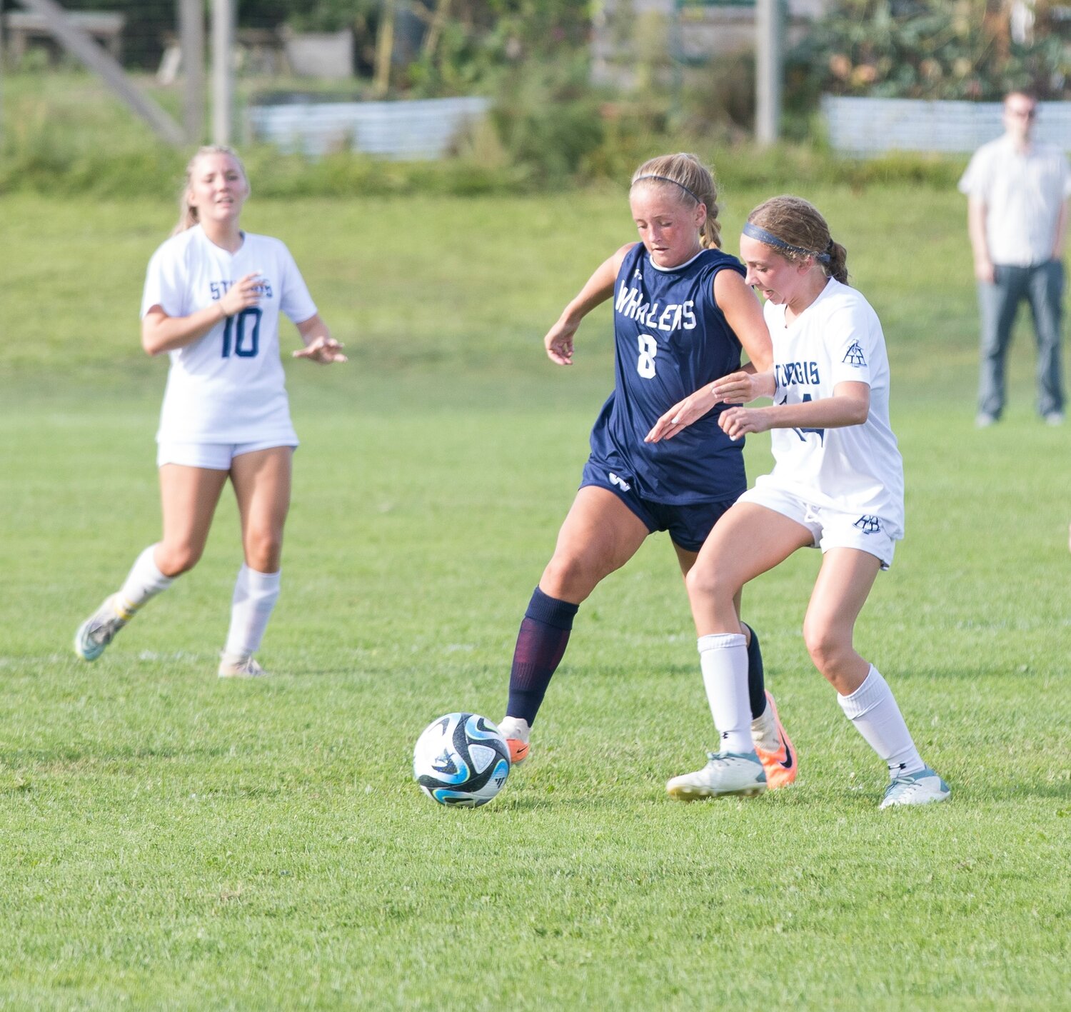 Gianna Quinn dribbles past a Sturgis East player during the Whalers' 4-0 win Thursday. The junior scored her first two goals of the season in the victory.