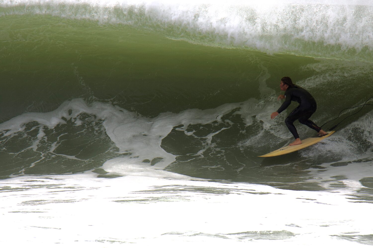 Several surfers took advantage of high surf from Hurricane Lee on Friday at Maddequecham Beach.