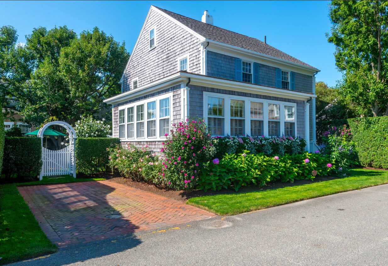 This charming, five-bedroom, two-bathroom home is located in the highly-sought-after Brant Point neighborhood, just on the outskirts of historic downtown Nantucket.