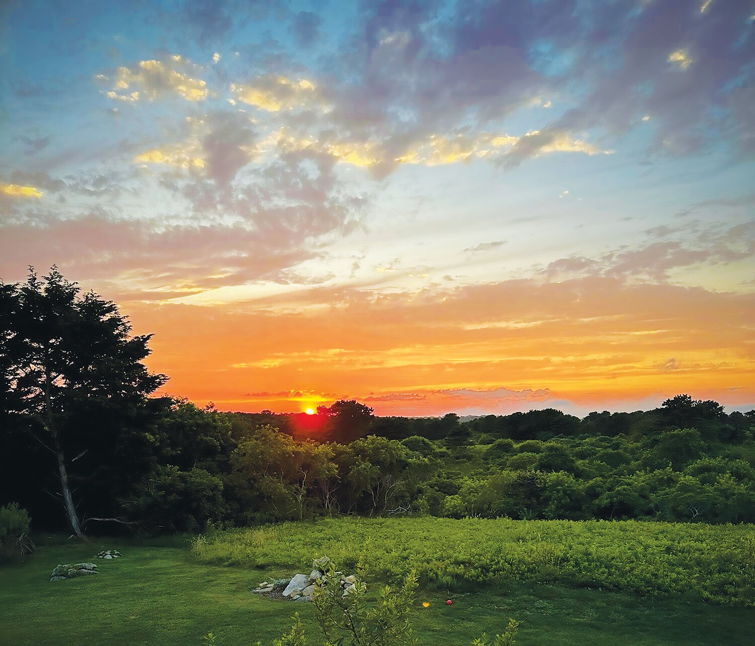 Situated high on a knoll, the 2.7-acre Madaket Road property is bordered by conservation land and is a wonderful place to take in sunsets off the island’s west end.