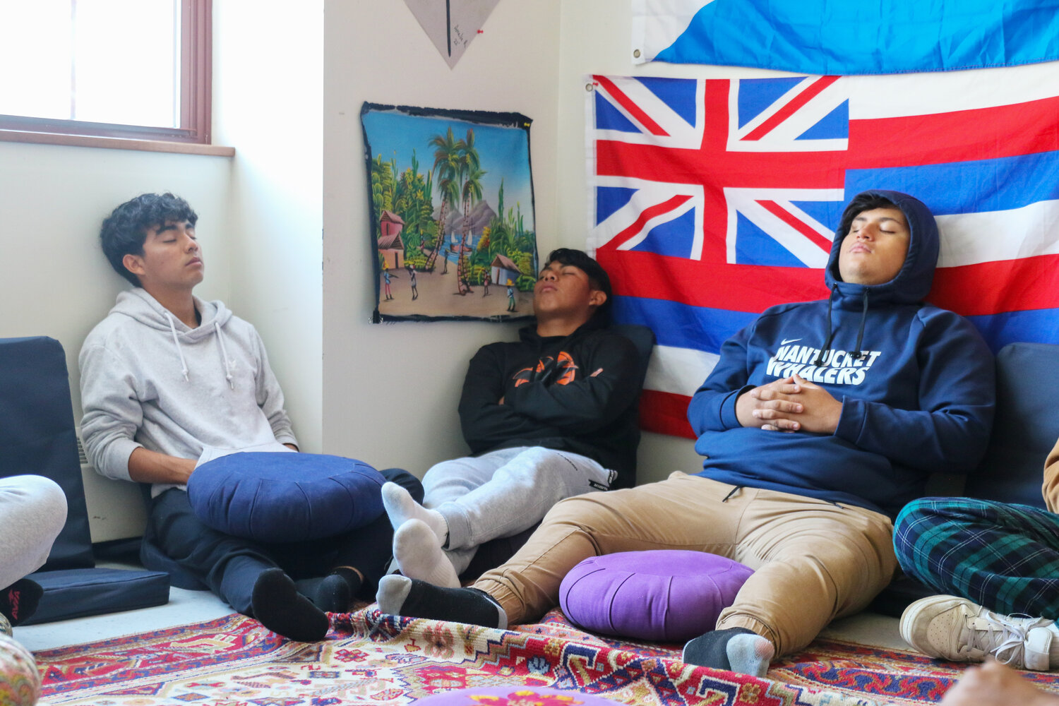 From left, Jose Diaz, Elvis Alonzo and Anderson Tejada during Andrew Viselli’s meditation class at Nantucket High School last month.