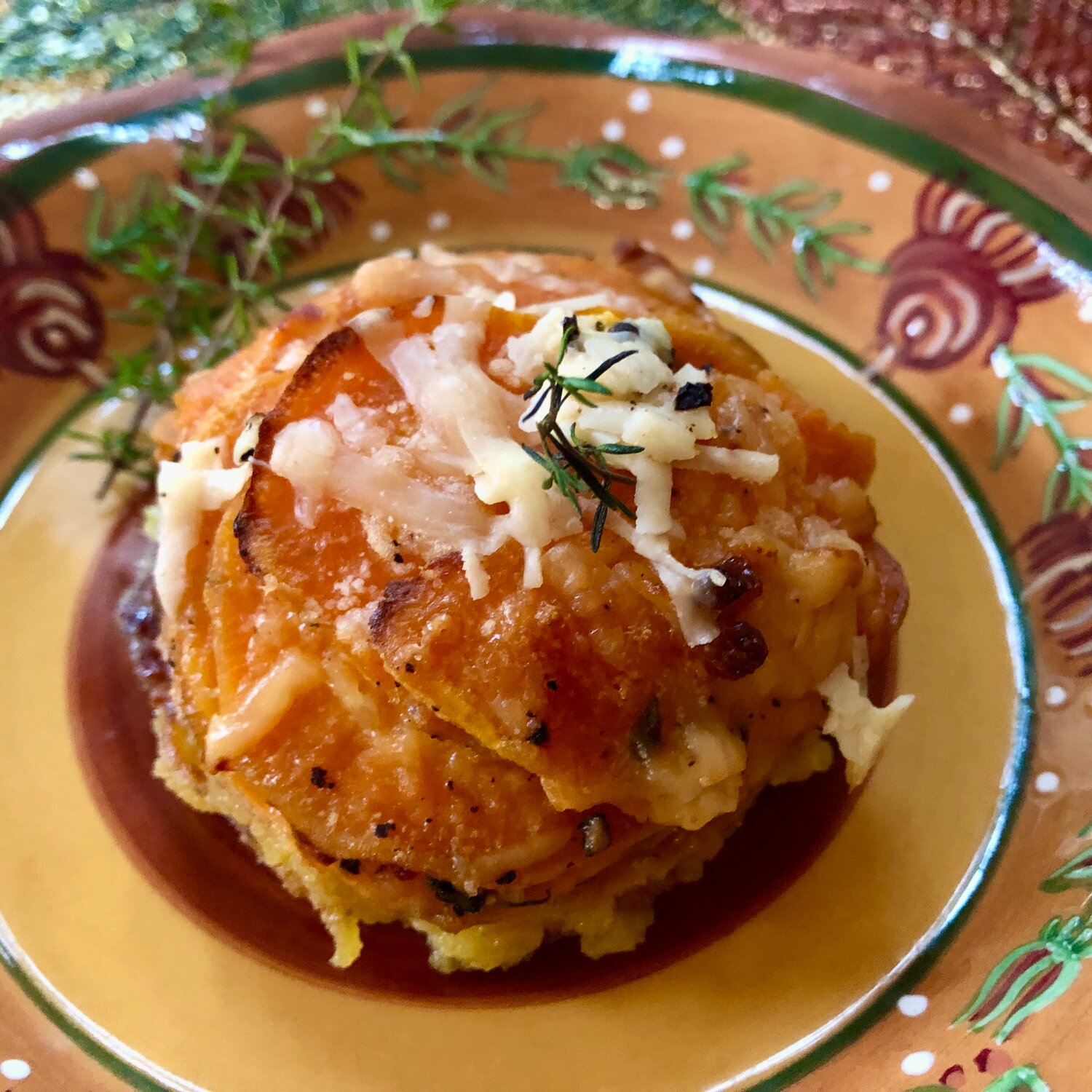 These savory sweet potato stacks are a decadent combination of sweet potato, butter, thyme and sharp Vermont Cheddar cheese.